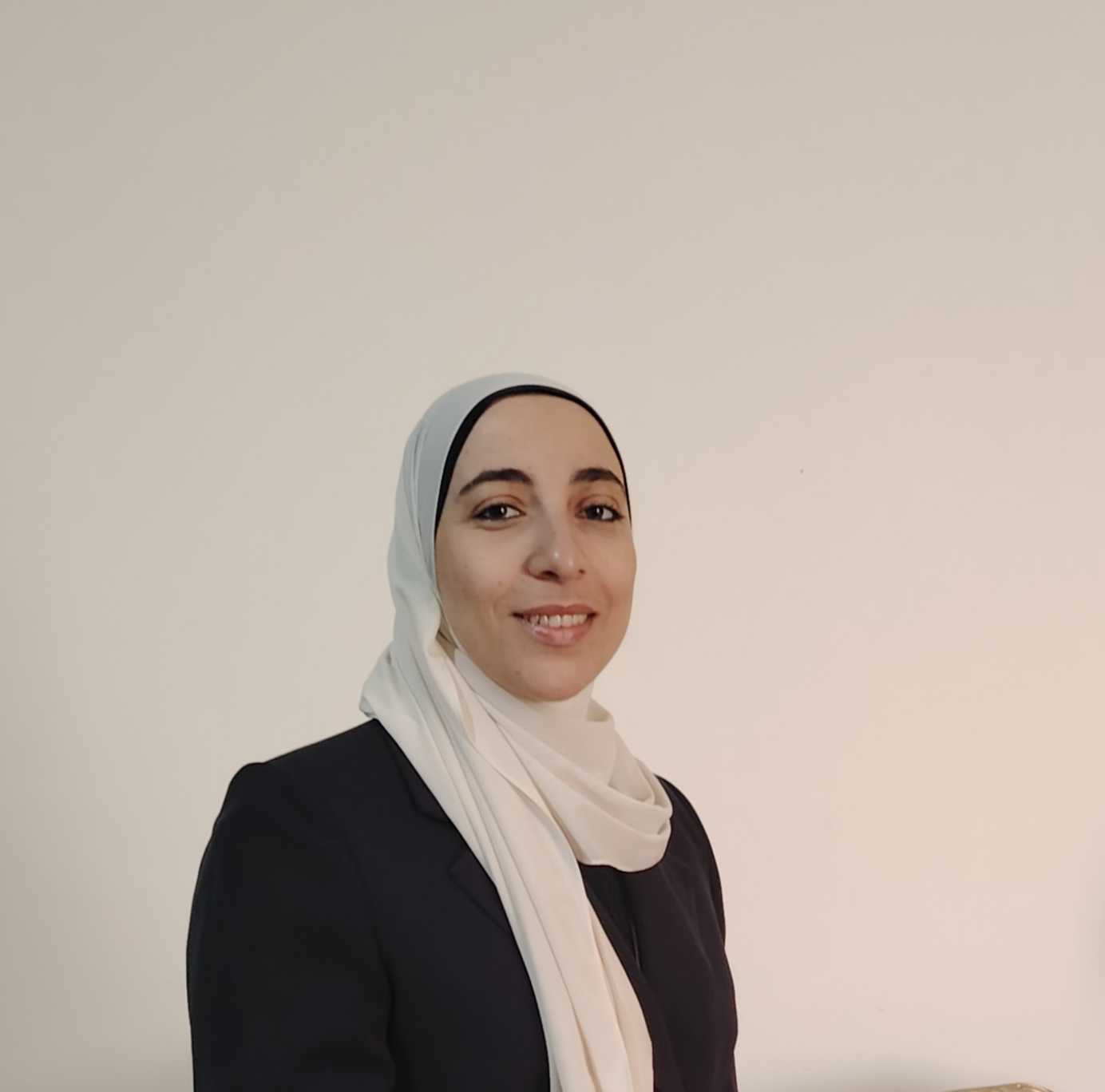 Dr. Mona Kamel Moawad