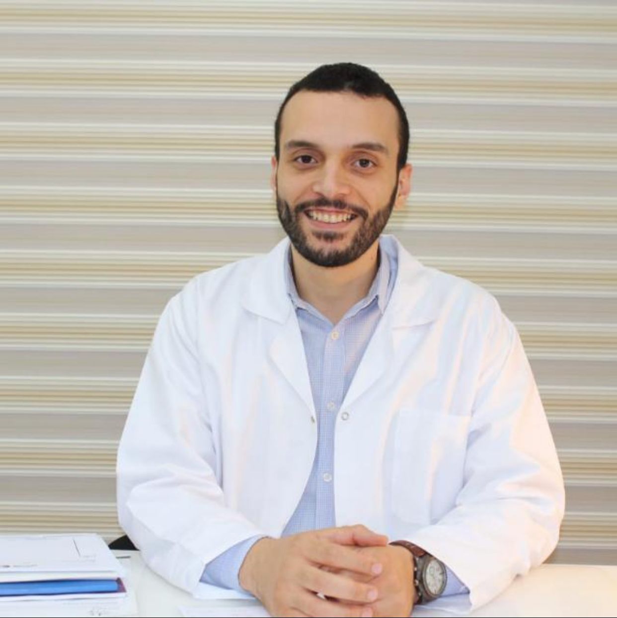 Dr. Karim Adel