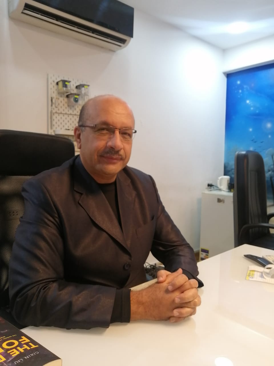 Dr. Hossam El-Zembely